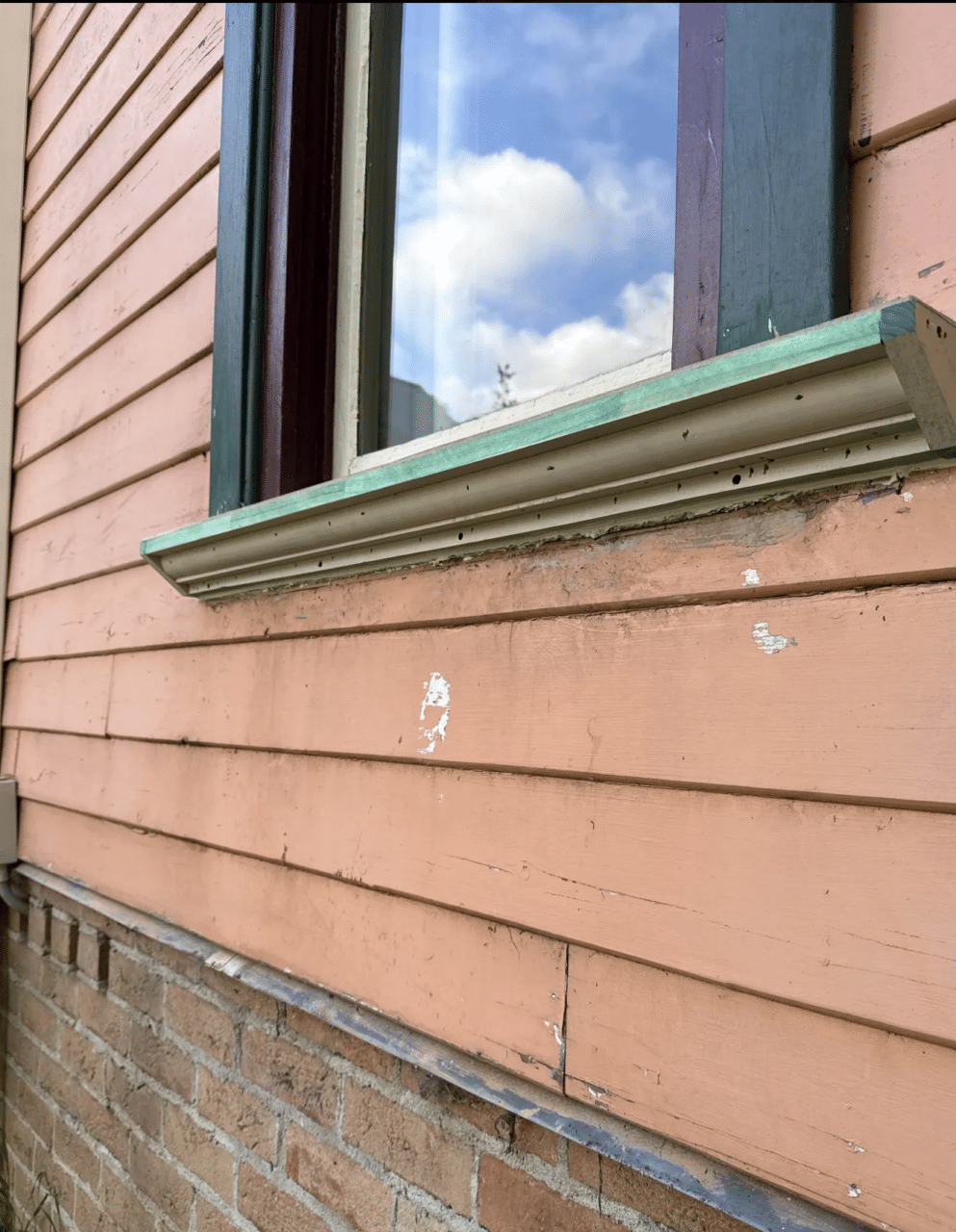 Outdoor shot of the wooden fascia of a house.